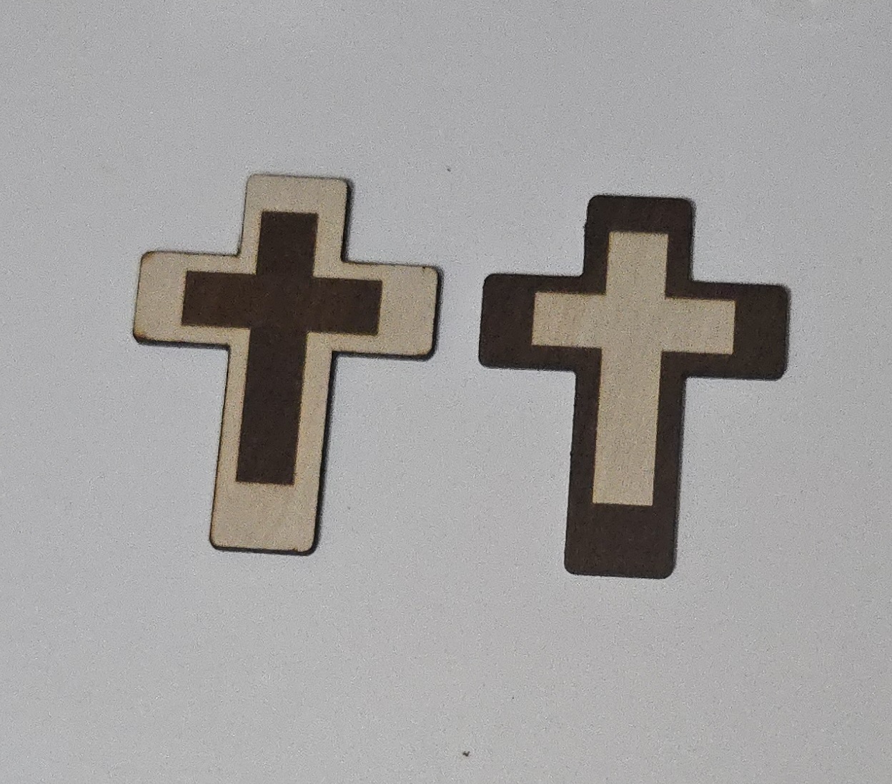 Two-tone simple wooden crosses, laser-cut and assembled by PetiteTrace